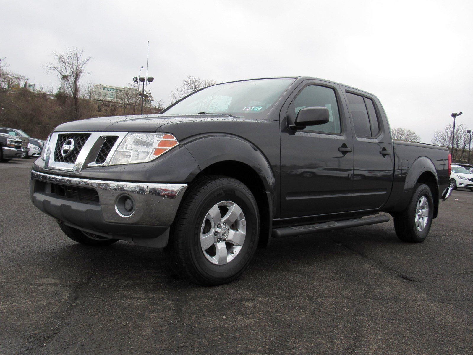 Pre-Owned 2010 Nissan Frontier SE Crew Cab Pickup in ...